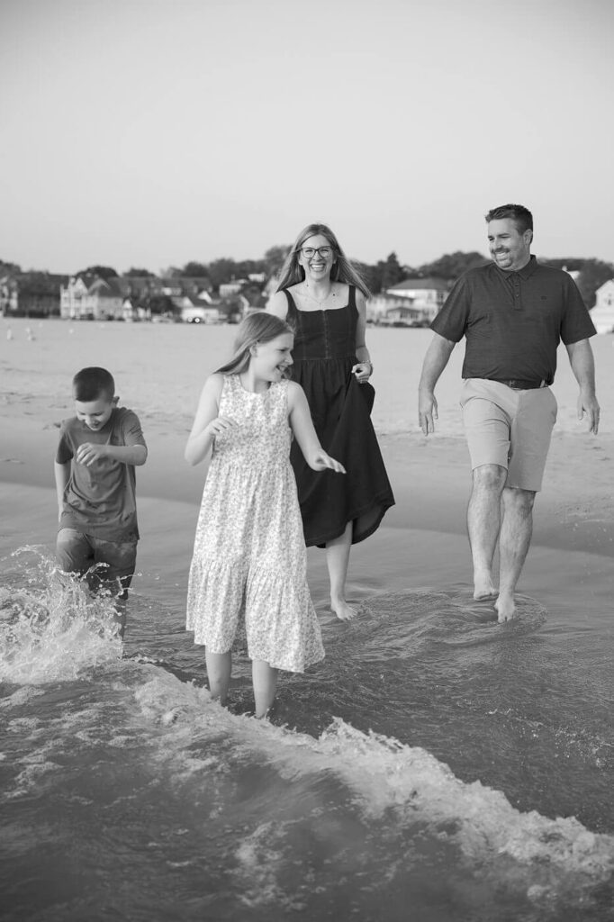 amily enjoying a wide open shoreline at North Beach, South Haven